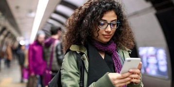 Woman looking at a cell phone